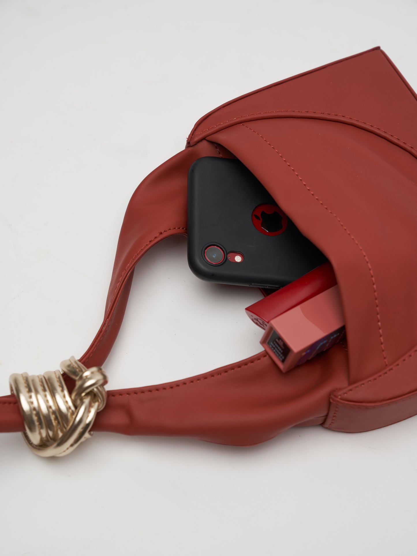 The knott wristlet - Berry